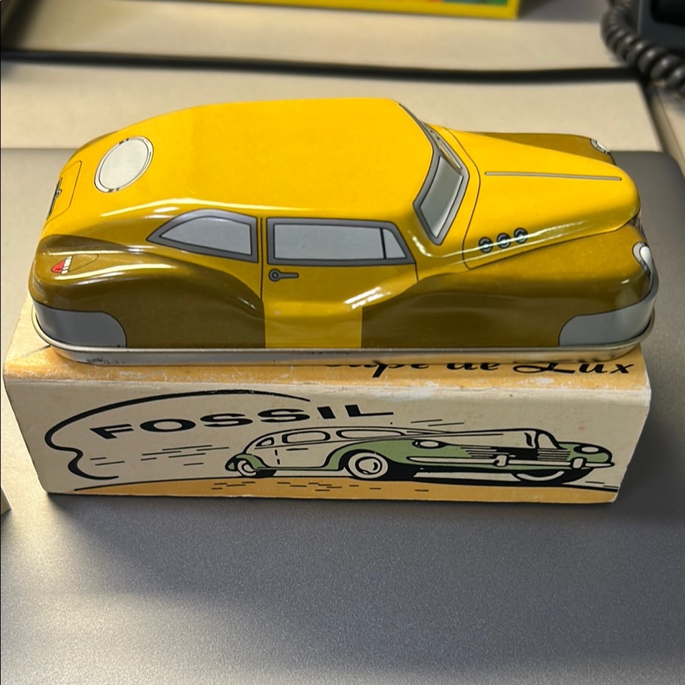 Fossil Yellow and Green Car Tin